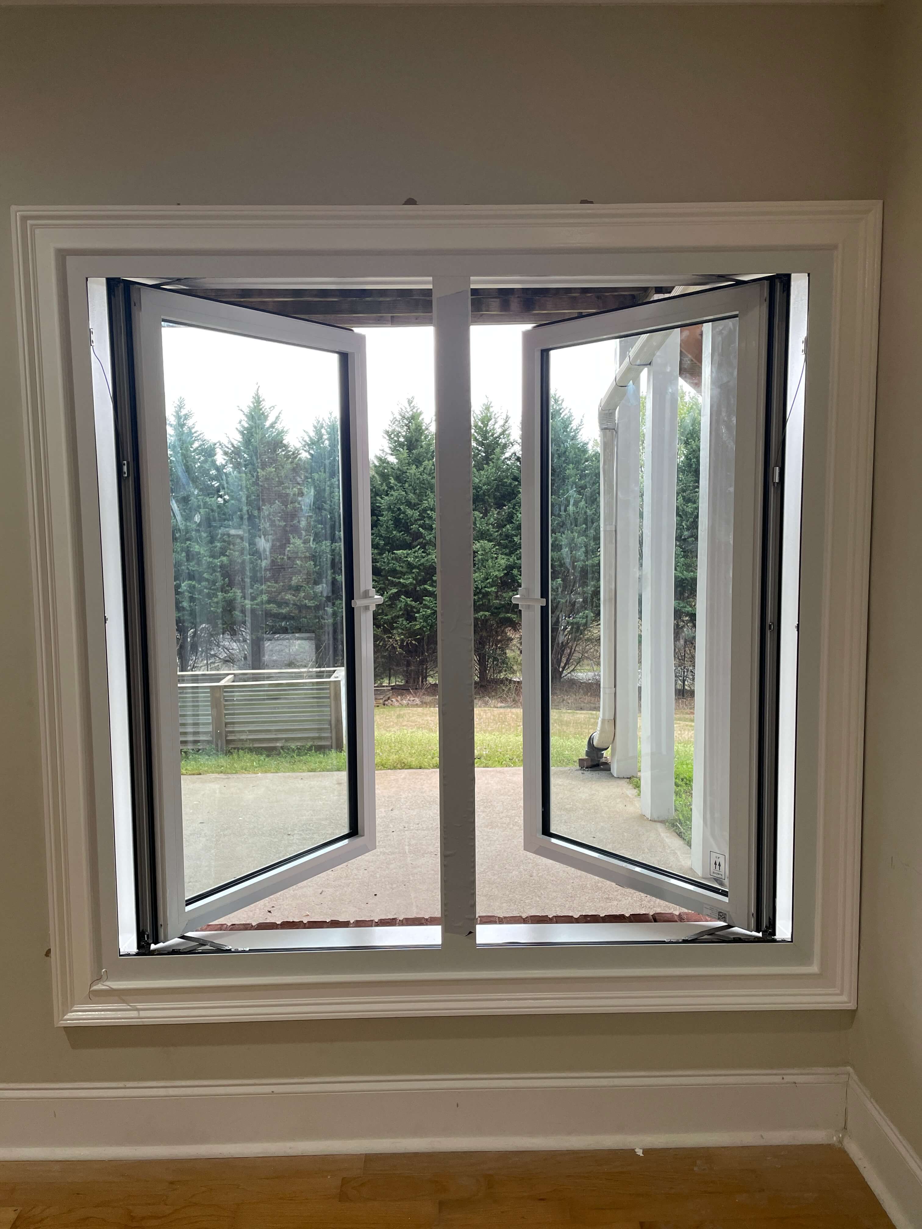 Casement window open interior view — energy-efficient window installation for homes