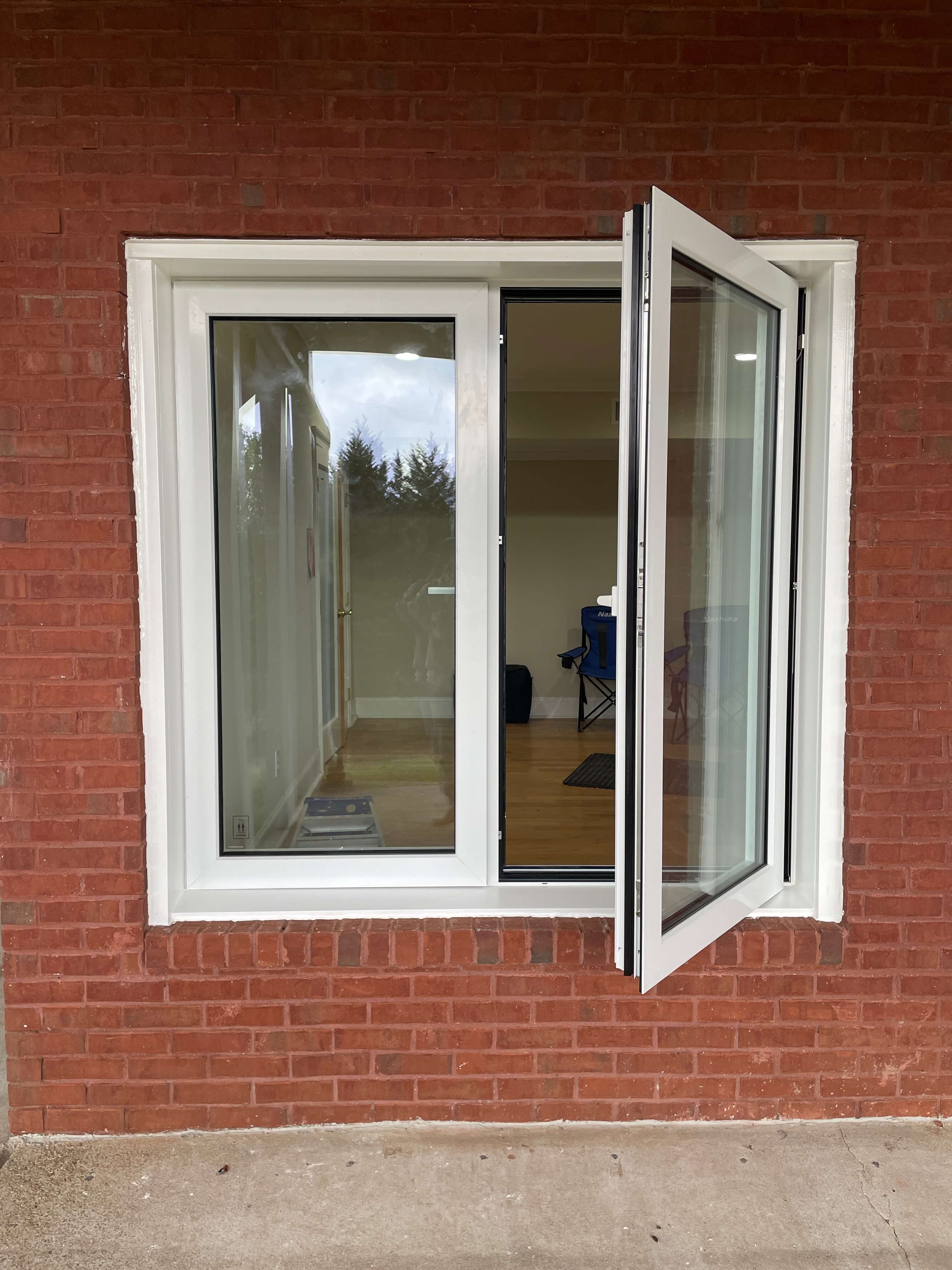Single casement window open from exterior — custom window solutions serving Northeast Georgia and nationwide